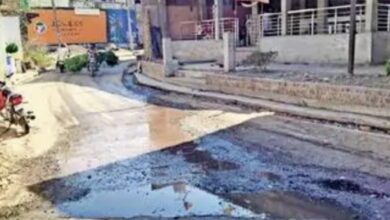 Drain water on road in Kuchad bike riders slipping